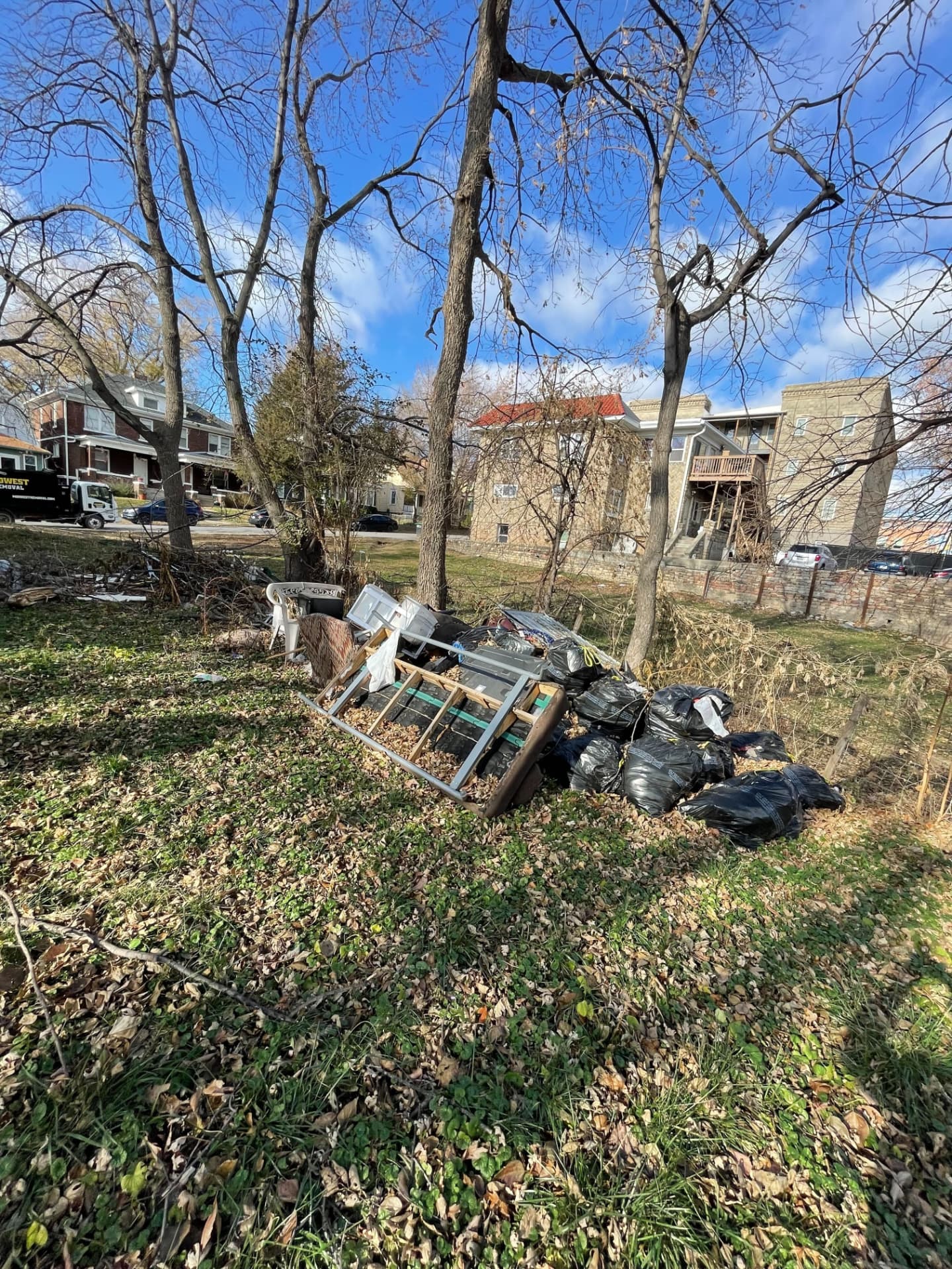 Bagged yard waste and debris staged for pickup, Omaha