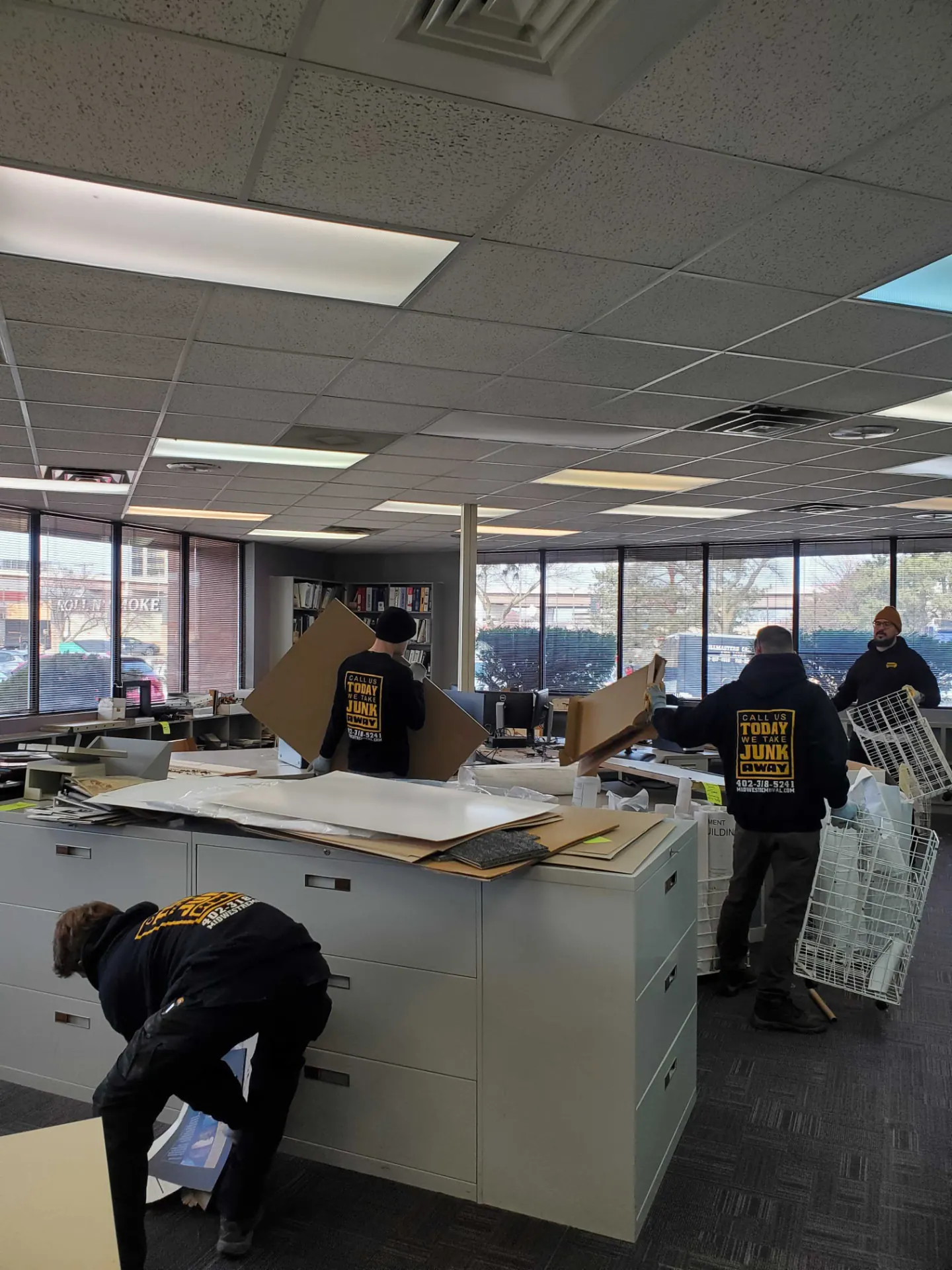 Office furniture and files boxed up for removal, Omaha