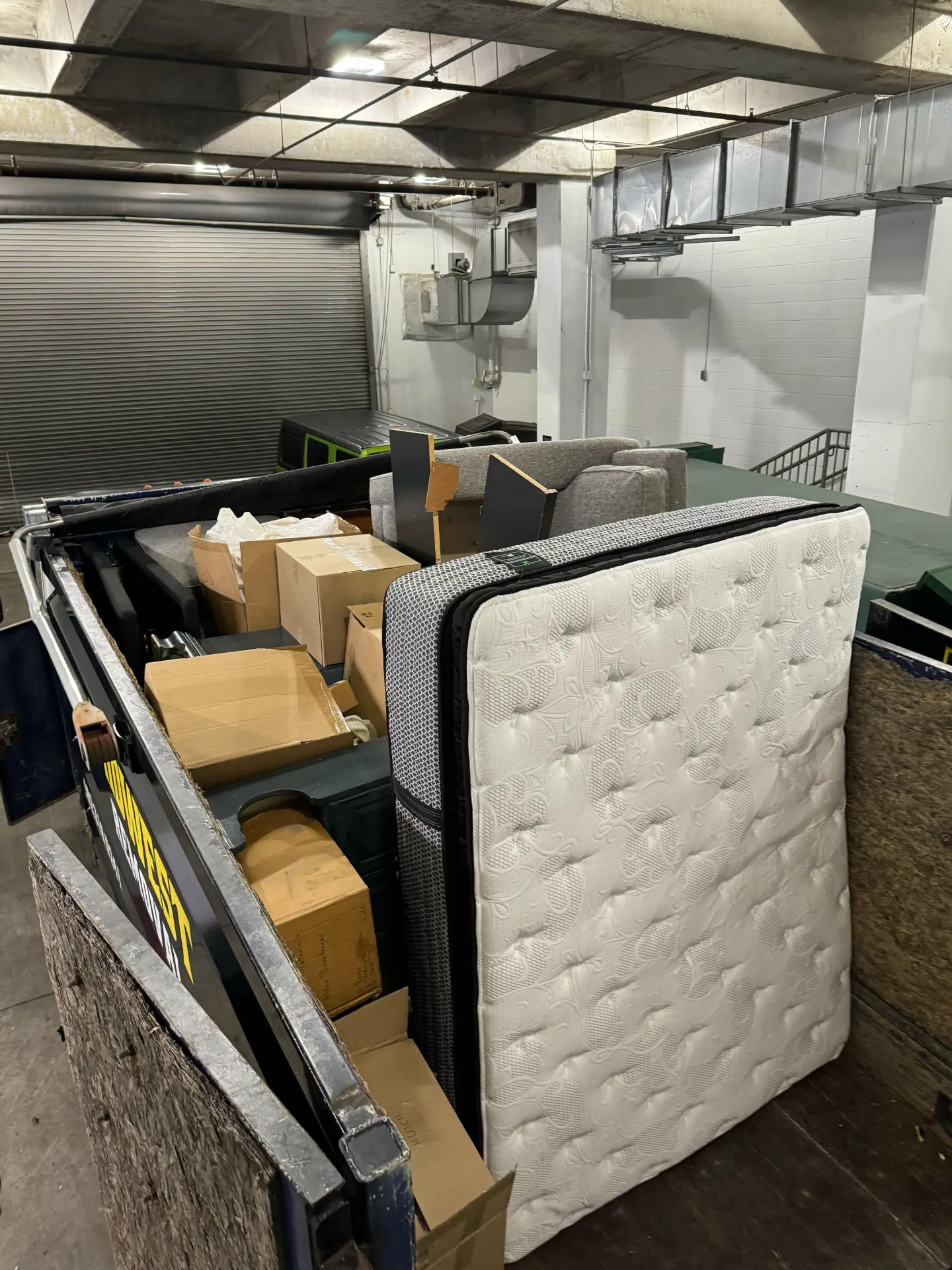 Truck loaded with warehouse furniture and boxes, Omaha