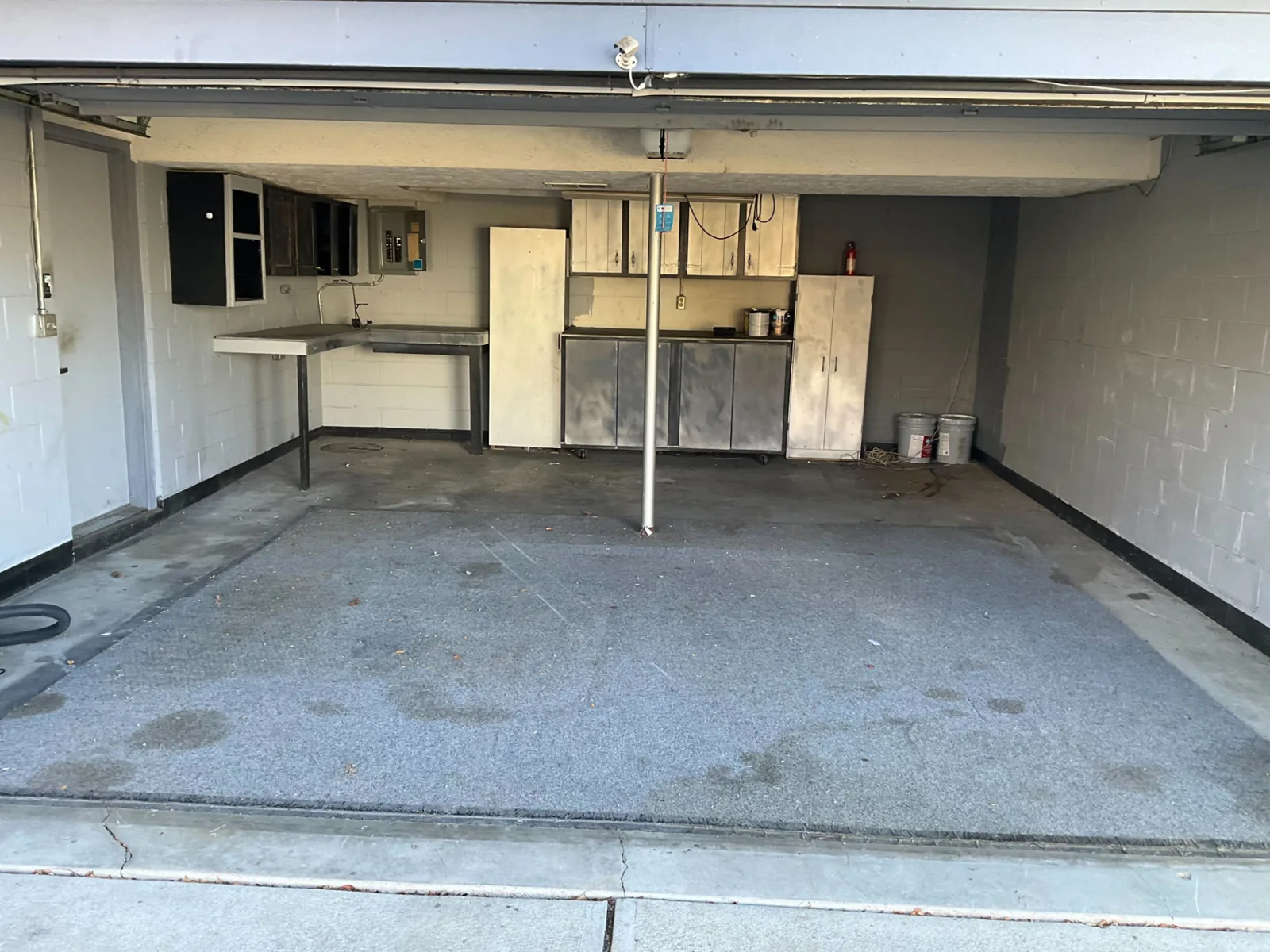 Emptied garage bay after a full Midwest Removal cleanout