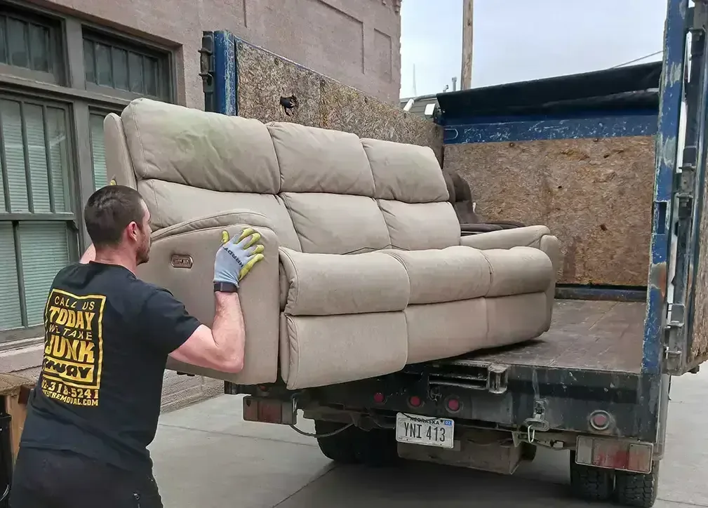 Loading a sectional couch into the truck, Omaha
