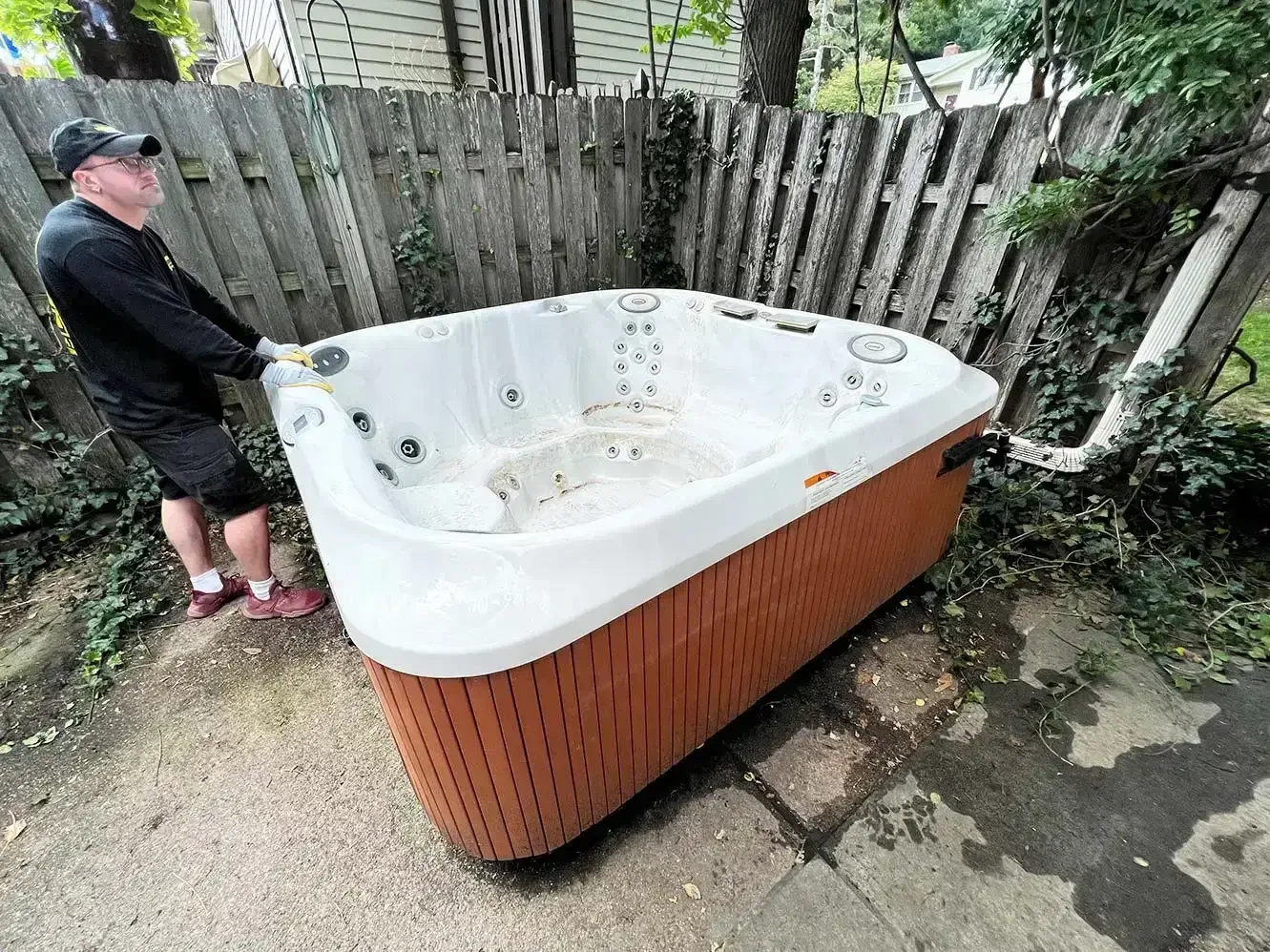 Hot tub moved out for removal, Omaha