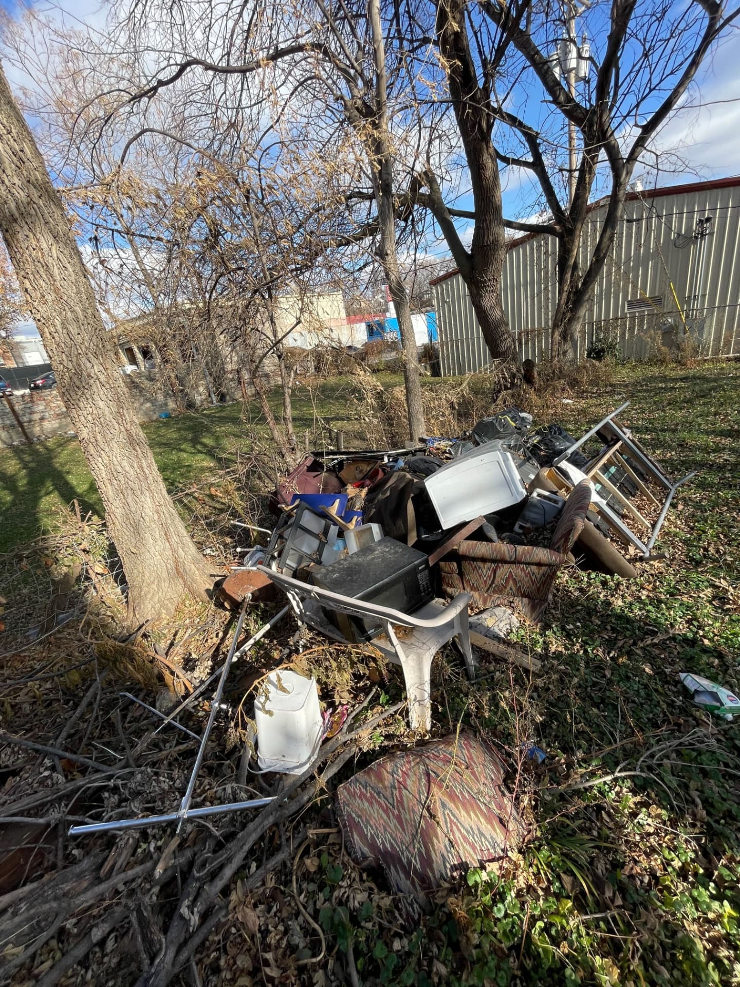 Yard debris and bulk items cleared from an Omaha lot