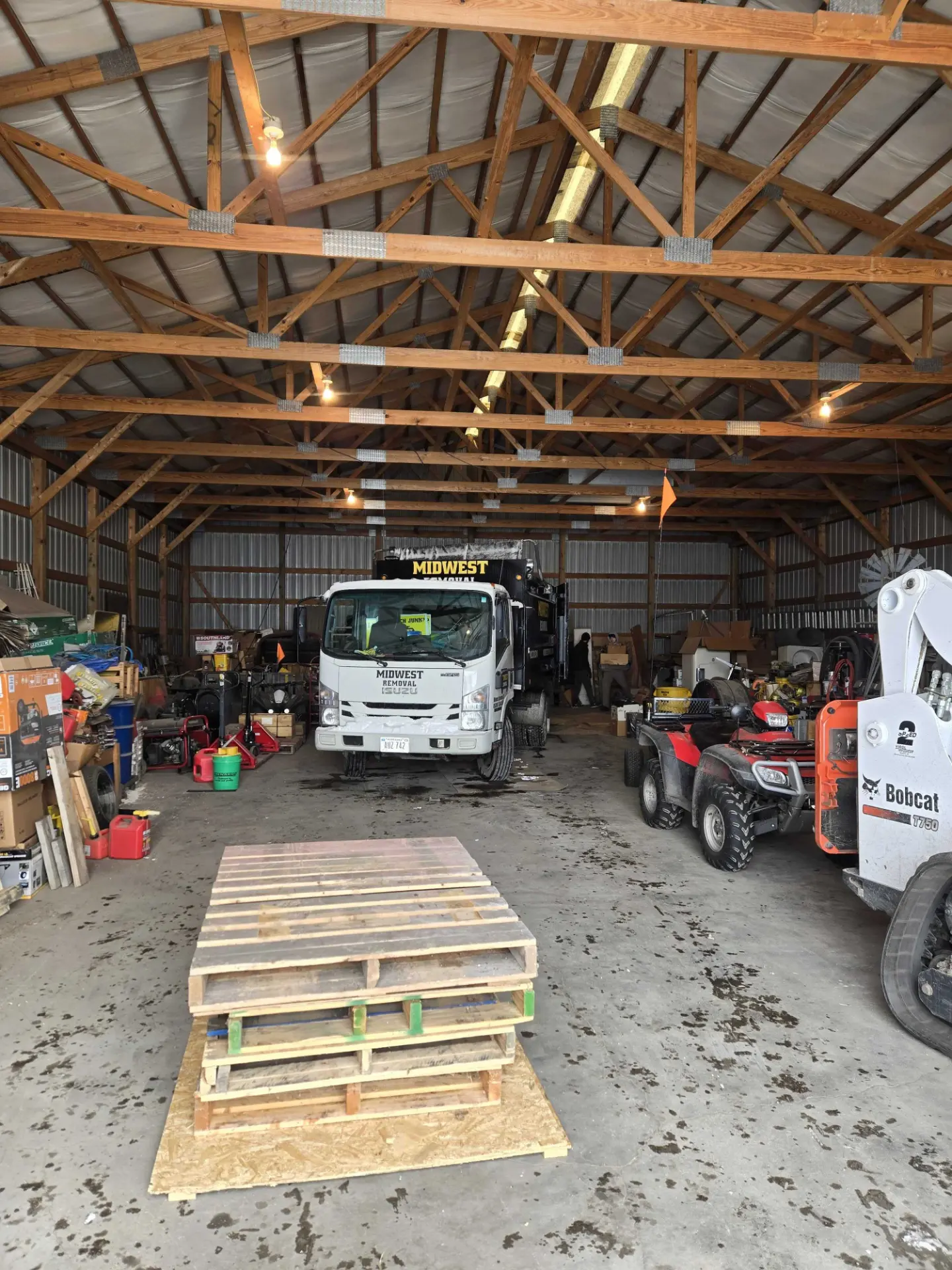 Midwest Removal truck inside a warehouse bay, Omaha