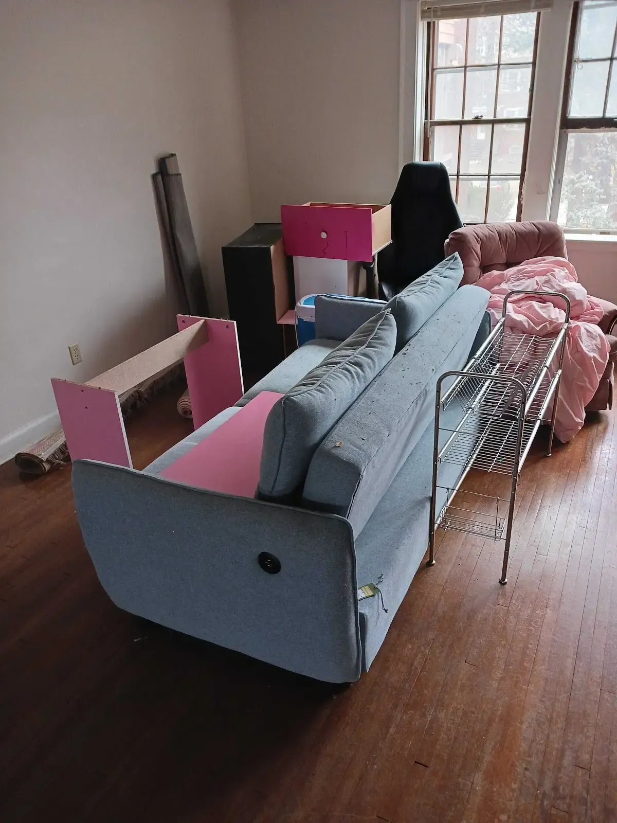 Unit cleanout with furniture and household items ready to haul